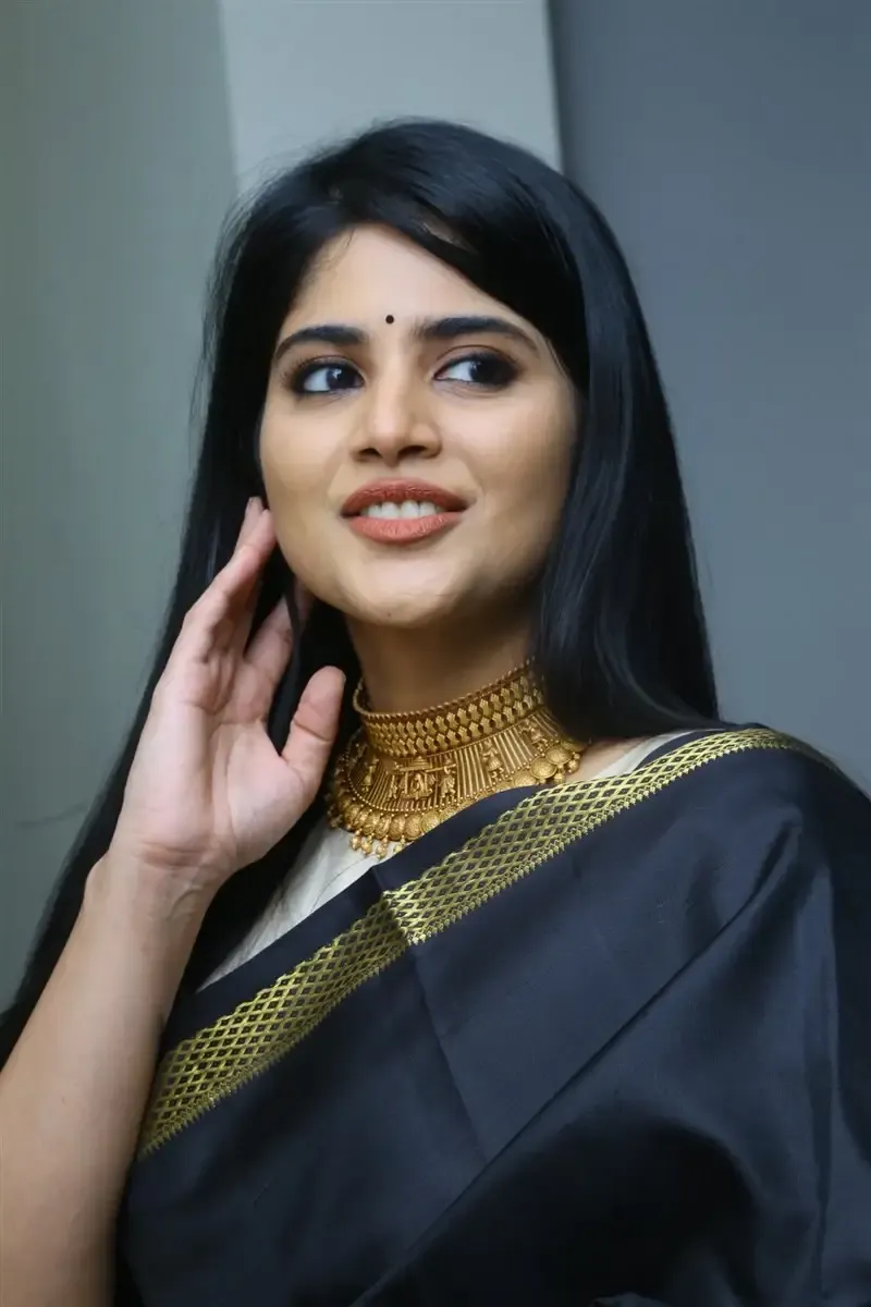 Megha Akash in Black Saree at Manu Charitra Telugu Movie Trailer Launch